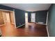 Inviting living room with hardwood floors, neutral paint, and ample natural light at 3873 Jane Marie Ln, Decatur, GA 30035