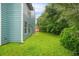 Sprawling backyard and home's exterior at 4753 Klondike Cv, Lithonia, GA 30038
