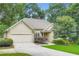 Charming one-story home featuring a two-car garage, well-kept lawn, and mature trees, ideal for comfortable living at 2676 Varner Ne Dr, Atlanta, GA 30345