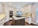 Bright kitchen with stainless steel appliances, granite countertops, and a large island with cooktop at 2676 Varner Ne Dr, Atlanta, GA 30345