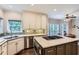 Open kitchen featuring stainless steel appliances, granite countertops, and large island with gas cooktop at 2676 Varner Ne Dr, Atlanta, GA 30345