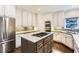 Modern kitchen with stainless steel appliances, granite countertops, a center island, and ample cabinet space, perfect for cooking at 2676 Varner Ne Dr, Atlanta, GA 30345