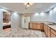 Convenient kitchenette featuring ample cabinet space, large fridge, and direct access to bedroom at 2676 Varner Ne Dr, Atlanta, GA 30345