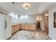 Functional kitchenette featuring modern cabinets, stainless sink, and tile flooring at 2676 Varner Ne Dr, Atlanta, GA 30345