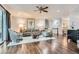 Bright living room features hardwood floors, neutral decor, ceiling fan and sliding glass doors to the outdoor living area at 2676 Varner Ne Dr, Atlanta, GA 30345