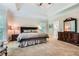 Large main bedroom with tray ceiling, carpeted floor, and ensuite bathroom access at 2676 Varner Ne Dr, Atlanta, GA 30345