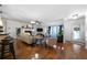 Cozy and inviting living room with fireplace and hardwood floors throughout the area at 4970 Lost Mountain Nw Trce, Kennesaw, GA 30152