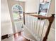 Grand foyer with a chandelier, staircase and a view into the main bedroom at 5418 Amity Dr, Powder Springs, GA 30127