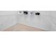 Empty walk-in closet with wire shelves, carpeting, and lots of storage space at 5418 Amity Dr, Powder Springs, GA 30127