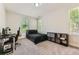 This bedroom has carpet and a window for natural light at 816 S Columbia Dr, Decatur, GA 30030
