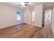 Bedroom with hardwood floors, a ceiling fan, a walk in bathroom and a closet at 909 Shiloh Ridge Nw Run, Kennesaw, GA 30144
