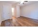 Spacious bedroom featuring hardwood floors, a closet, ensuite and a ceiling fan at 909 Shiloh Ridge Nw Run, Kennesaw, GA 30144