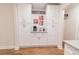 Bright coffee bar featuring white cabinets, granite countertops and decorative items at 909 Shiloh Ridge Nw Run, Kennesaw, GA 30144