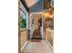 Inviting front entrance featuring a stone wall accent, white door with wreath and a 'HOME' welcome mat at 909 Shiloh Ridge Nw Run, Kennesaw, GA 30144