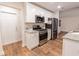 Kitchen featuring stainless appliances, granite countertops and white cabinets at 909 Shiloh Ridge Nw Run, Kennesaw, GA 30144