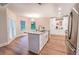 Bright kitchen featuring stainless appliances, hardwood floors, granite countertops and a coffee bar at 909 Shiloh Ridge Nw Run, Kennesaw, GA 30144