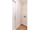Laundry closet featuring access to hookups and a convenient shelf at 909 Shiloh Ridge Nw Run, Kennesaw, GA 30144