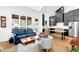 Open-concept space showcasing a seamless blend of kitchen, dining, and living areas with an abundance of light at 10862 Serenbe Ln, Chattahoochee Hills, GA 30268