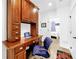 Stylish office featuring a built-in desk, comfortable chair, and natural light, perfect for working from home at 10862 Serenbe Ln, Chattahoochee Hills, GA 30268