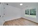Bedroom with window and closet at 1534 River Rock Trce, Woodstock, GA 30188