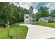 Charming two-story home with a well-manicured lawn and inviting curb appeal at 1534 River Rock Trce, Woodstock, GA 30188
