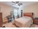 Bedroom featuring a wooden bed and neutral walls at 3906 Elm Trace Ct, Loganville, GA 30052