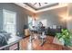 Bright and functional home office with hardwood floors and plenty of workspace at 3906 Elm Trace Ct, Loganville, GA 30052