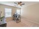 Bright home office with two windows and workspace at 3906 Elm Trace Ct, Loganville, GA 30052