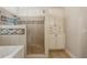 Walk in shower with glass door in primary bathroom at 4204 Woodfare Nw Ln, Kennesaw, GA 30152