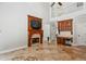 Living room featuring a fireplace, home office and a view of the home's second level at 4204 Woodfare Nw Ln, Kennesaw, GA 30152