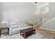Living area featuring tall ceilings, large windows, and neutral color palette at 4204 Woodfare Nw Ln, Kennesaw, GA 30152