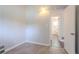 The bedroom features neutral walls and an attached bathroom with modern trim at 1538 Belva Ave, Decatur, GA 30032