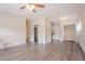 Spacious living room with hardwood floors, neutral walls, and modern ceiling fan at 1538 Belva Ave, Decatur, GA 30032