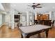 Spacious basement with hardwood floors, bar area, and fireplace, perfect for entertaining guests at 1589 Trentwood Ne Pl, Brookhaven, GA 30319