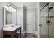 Modern bathroom features a glass-enclosed shower and a stylish vanity with marble countertop at 1589 Trentwood Ne Pl, Brookhaven, GA 30319