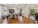 Elegant dining room with hardwood floors, coffered ceilings, and natural light at 1589 Trentwood Ne Pl, Brookhaven, GA 30319