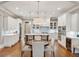 Modern kitchen with white cabinets, stainless steel appliances, and center island at 1589 Trentwood Ne Pl, Brookhaven, GA 30319