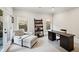 Bright home office featuring a large desk, comfortable seating, and ample natural light at 1589 Trentwood Ne Pl, Brookhaven, GA 30319