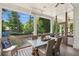 Relax on this screened porch, with wood floors, overlooking the backyard. Ideal spot for outdoor dining at 1589 Trentwood Ne Pl, Brookhaven, GA 30319
