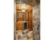 Stunning wine cellar with custom racking, storage cabinets, and room for wine collections at 1589 Trentwood Ne Pl, Brookhaven, GA 30319