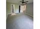 A primary bedroom with a fan and two closets at 168 Park Ln, Dallas, GA 30157