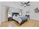 Bedroom featuring neutral walls and decor, a ceiling fan, and natural light at 2728 Mcafee Rd, Decatur, GA 30032