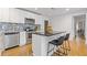 Open kitchen design with stainless appliances and center island with seating at 2728 Mcafee Rd, Decatur, GA 30032