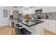 Kitchen island offers counter seating, storage and stainless steel appliances at 2728 Mcafee Rd, Decatur, GA 30032