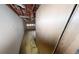Unfinished basement showing exposed rafters, walls, and ground level access at 33 Powder Dr, Dallas, GA 30157