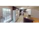 Modern kitchen with stainless steel appliances, white refrigerator, and dark cabinetry at 33 Powder Dr, Dallas, GA 30157