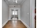 Hallway with hardwood floors leading to another room with glass doors at 733 Frederica Ne St # 7, Atlanta, GA 30306
