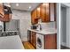 Efficient kitchen with stainless steel appliances and in-unit washer/dryer at 733 Frederica Ne St # 7, Atlanta, GA 30306