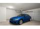 Clean garage featuring a sleek blue car, adding convenience and style at 804 Whittington Sw Pkwy, Marietta, GA 30060