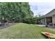Expansive backyard offering plenty of space for outdoor activities and features a well-manicured lawn at 1635 Lake Heights Cir, Dacula, GA 30019